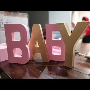 Pink and gold Minnie Mouse baby shower decorations